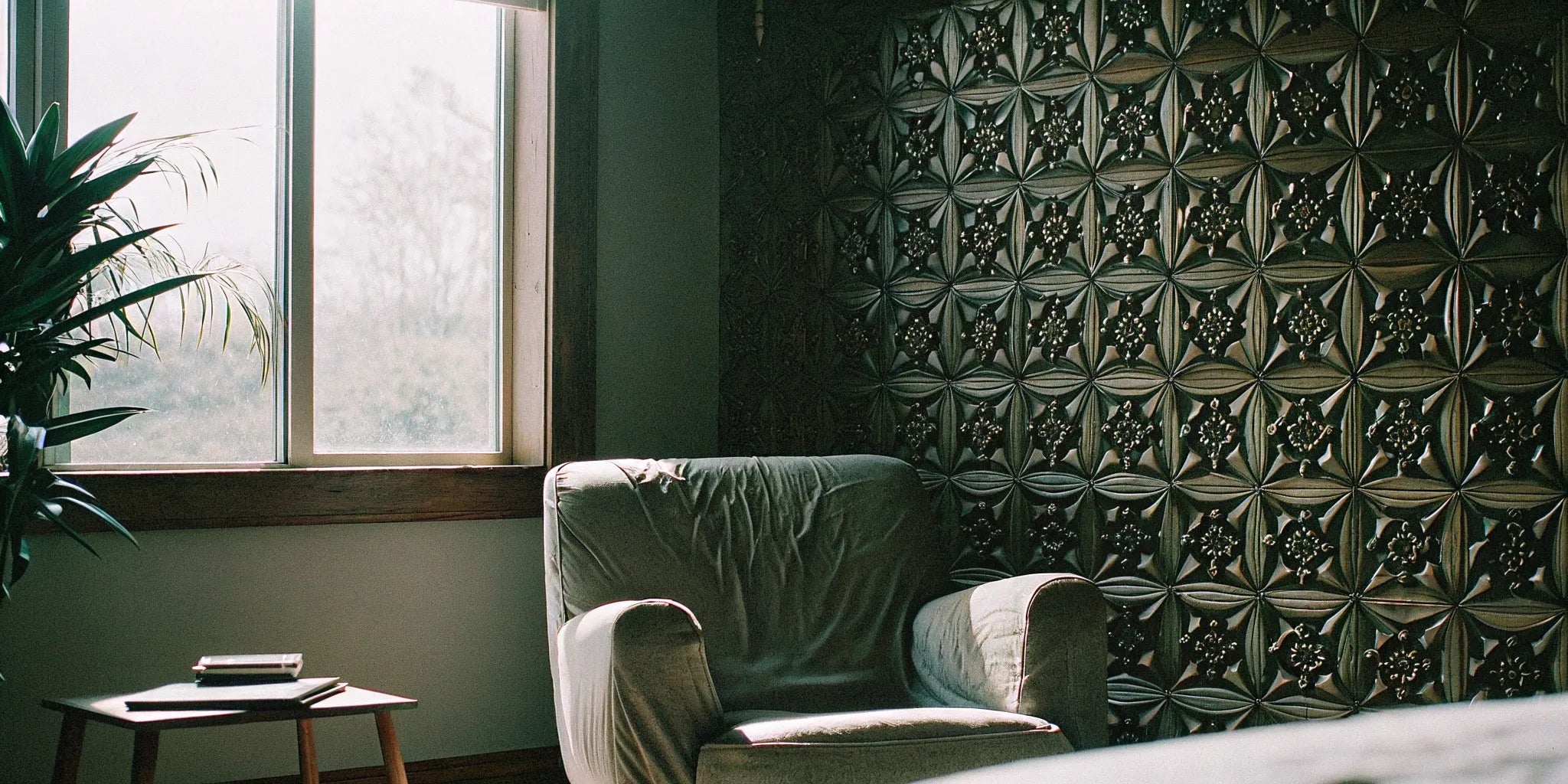 3D wall panels add depth and texture to a bedroom.