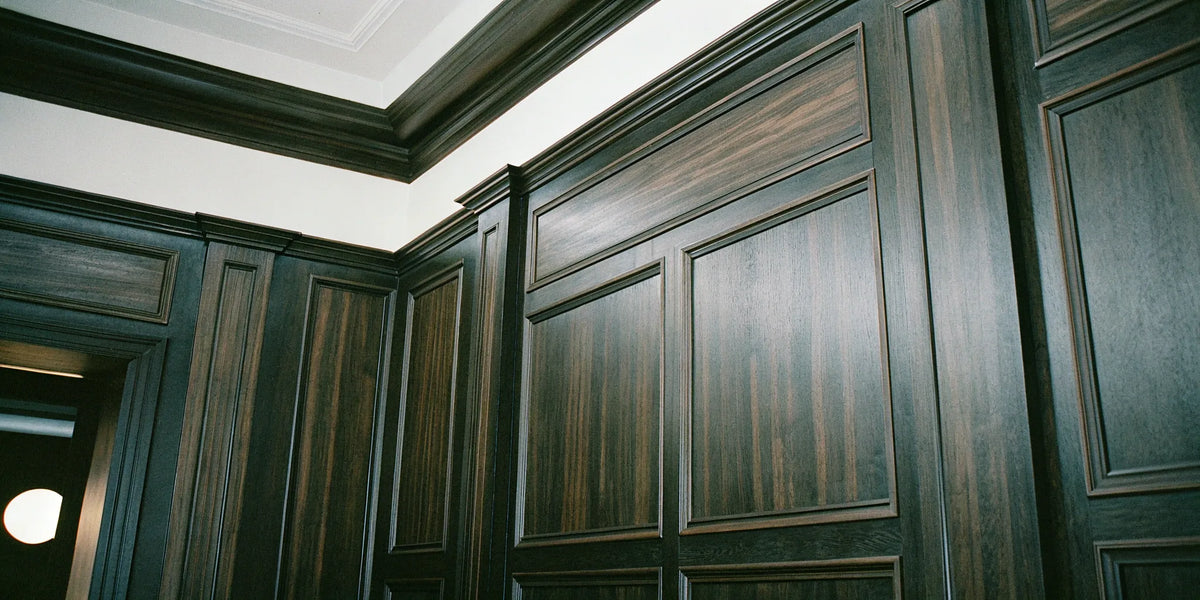 Dark fluted wood wall panels add depth and texture.