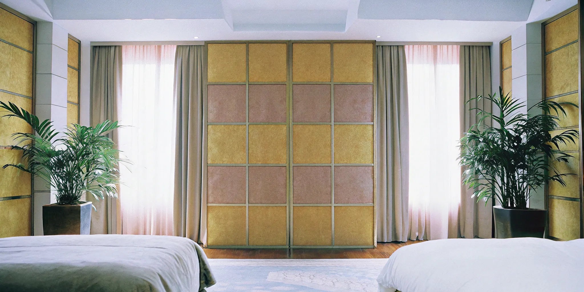 Soundproof wall panels absorb noise in a modern bedroom.