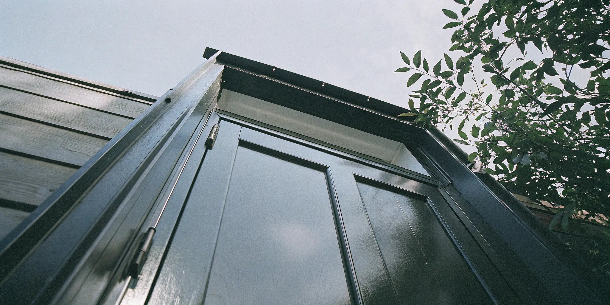 Sleek black steel exterior door.