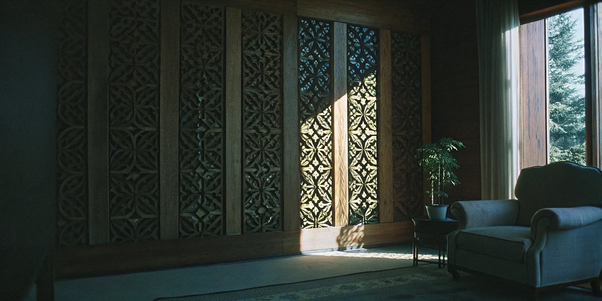 MDF tambour panels create a stylish accent wall in a modern living room.