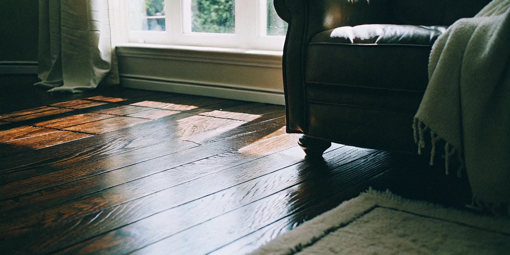 Rich-grained walnut hardwood flooring.