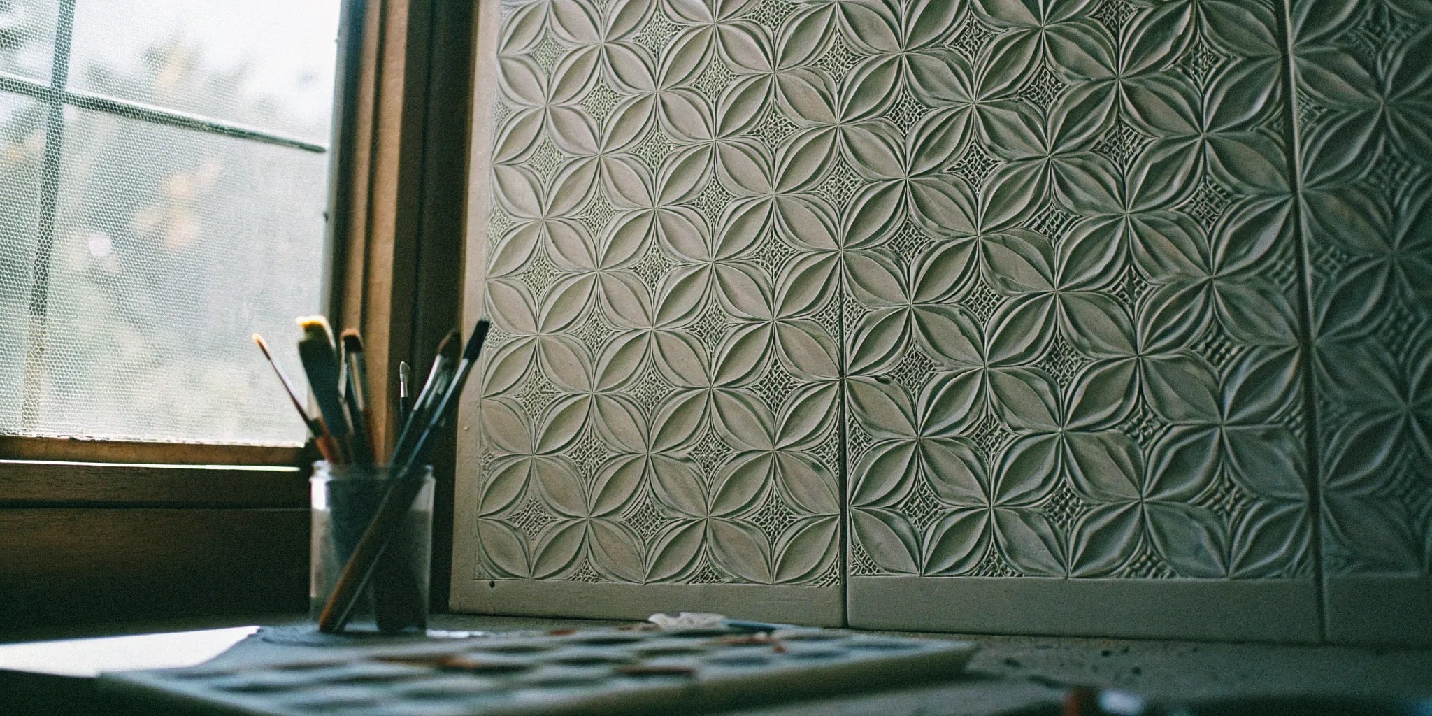 Textured geometric 4x8 paintable wall panels ready for a custom paint color.