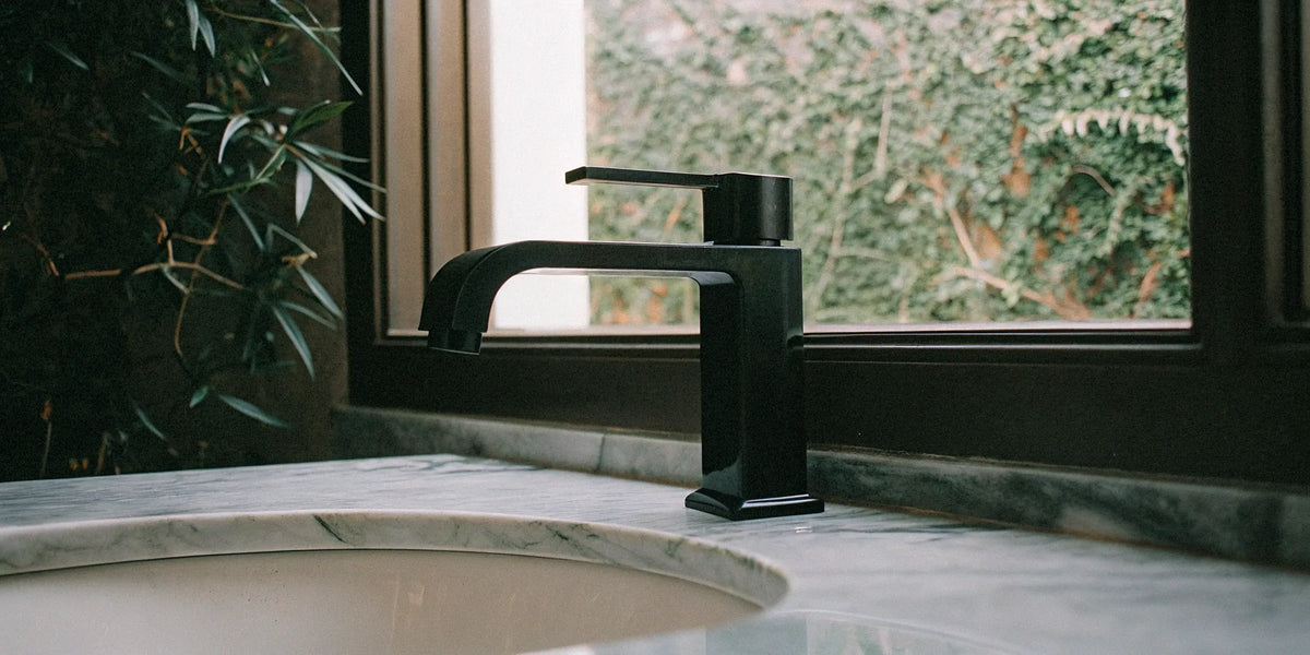 https://usabuildersdepot.com/cdn/shop/articles/7-best-modern-black-bathroom-sink-faucets-905700.webp?crop=center&height=1200&v=1767097513&width=1200