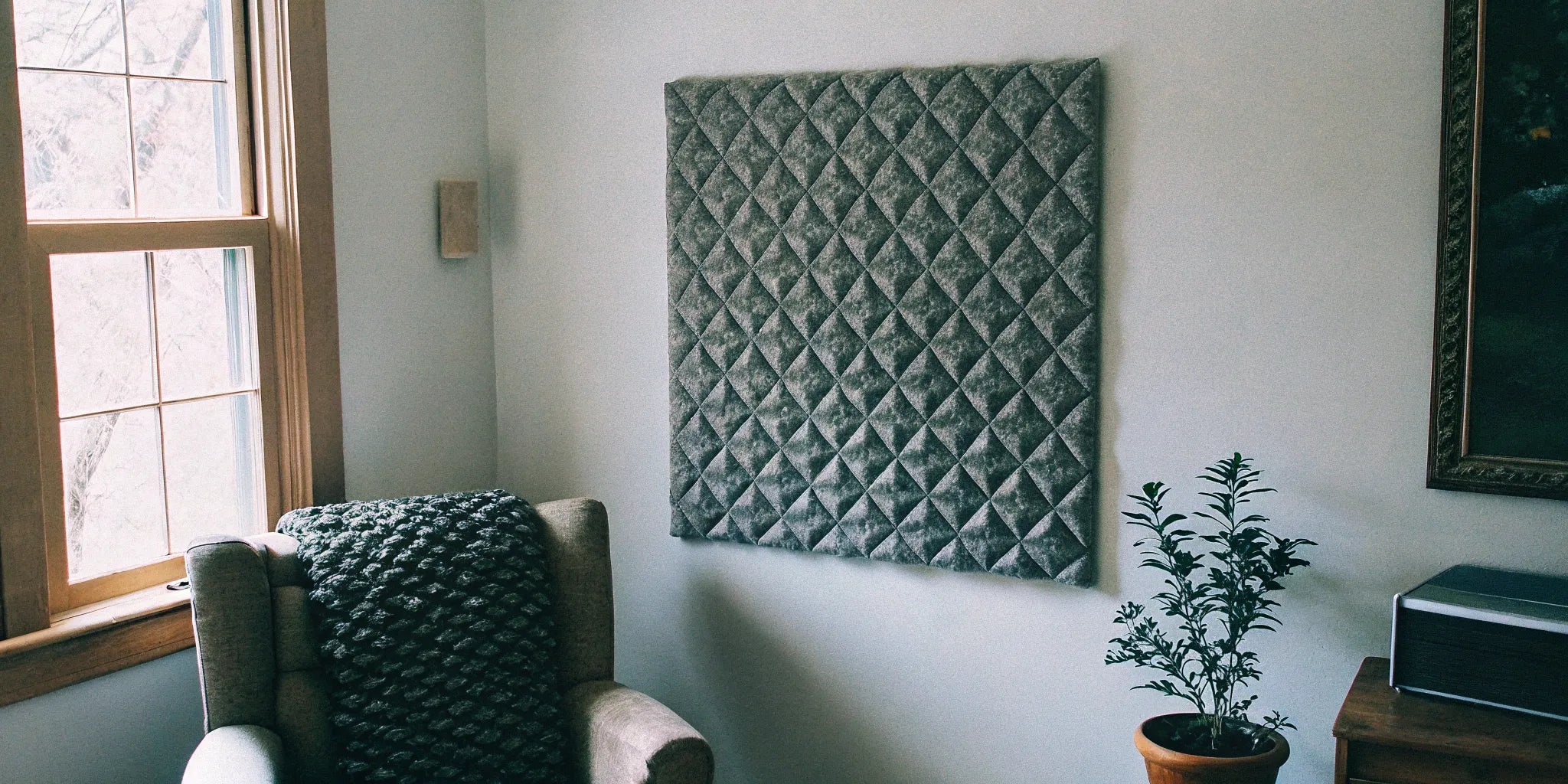 A decorative acoustic wall panel improving the sound and style of a modern room.