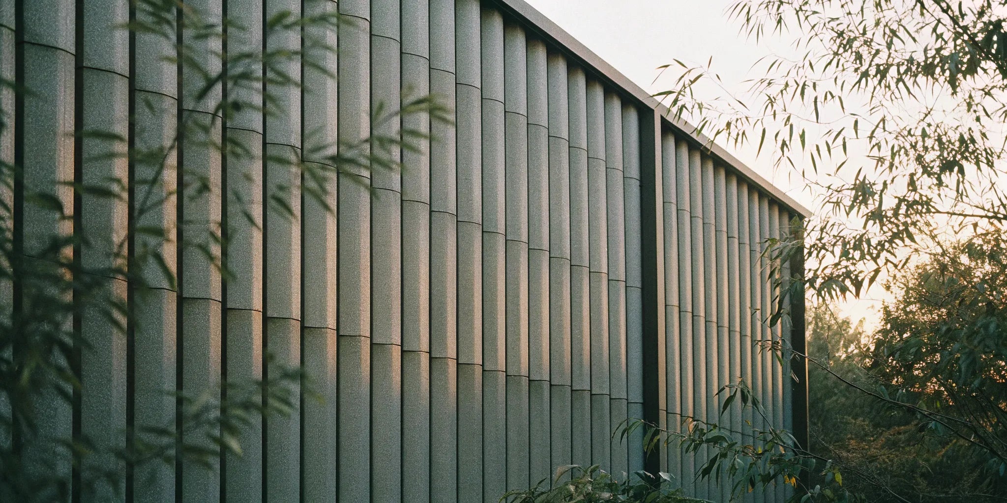 Modern exterior fluted wall panels on a commercial building facade.