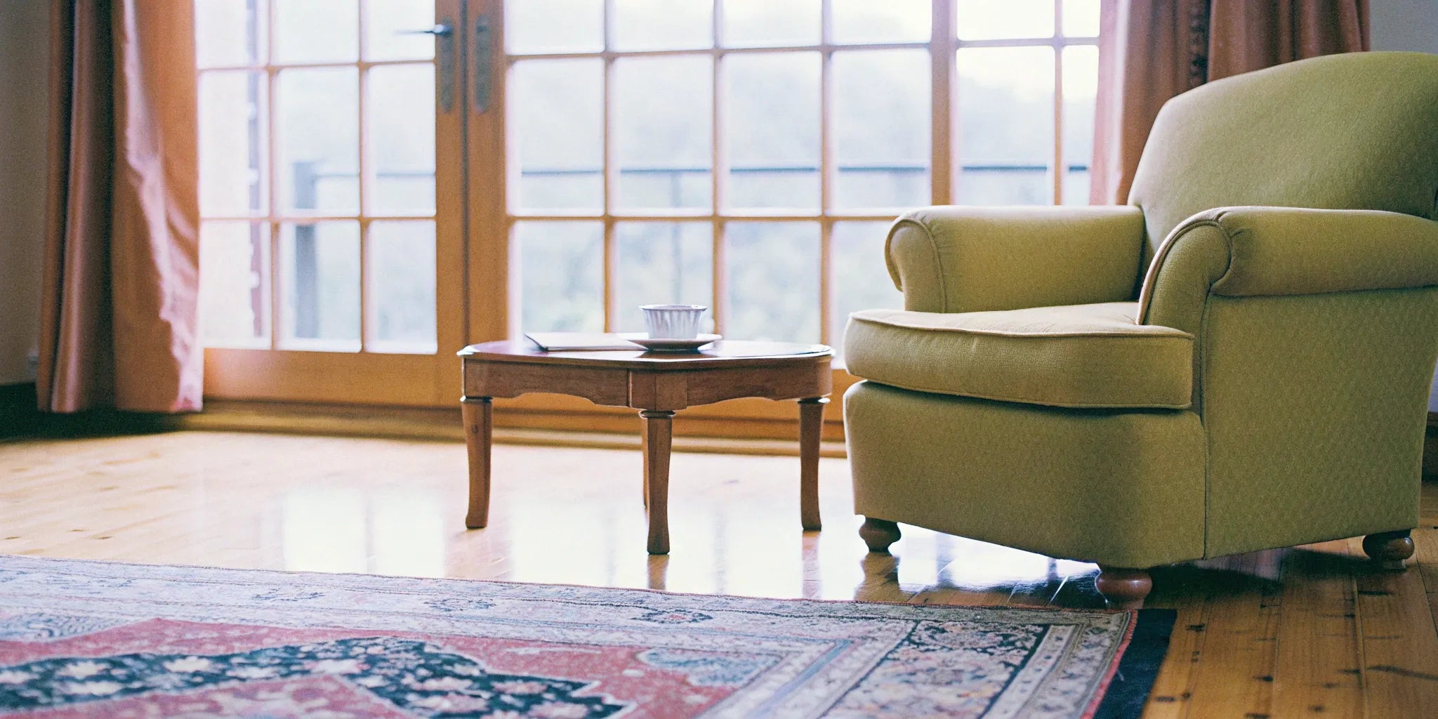 Hardwood or engineered wood flooring in a living room.
