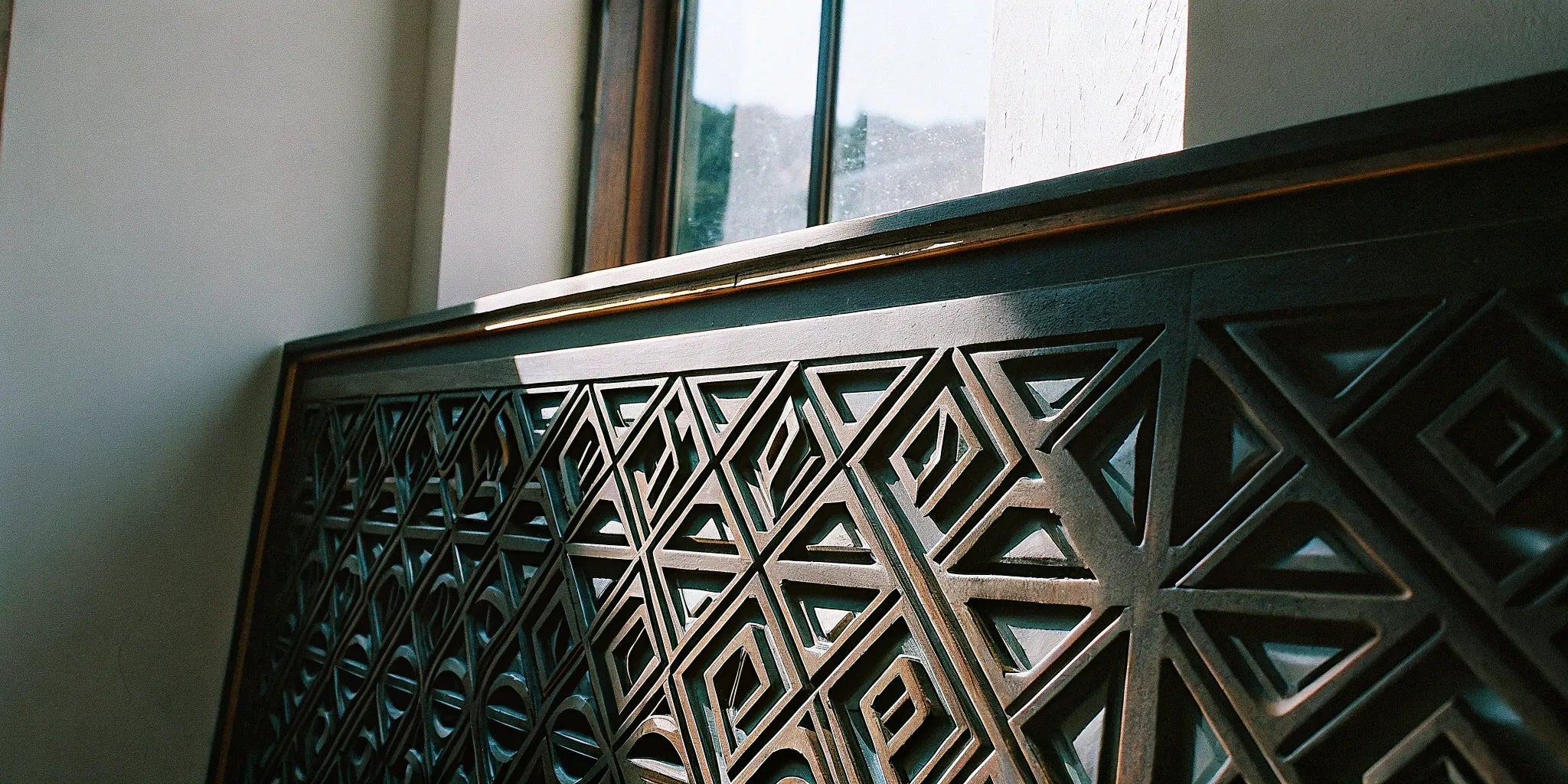 A feature wall showing the final result of how to install 3D wall panels.