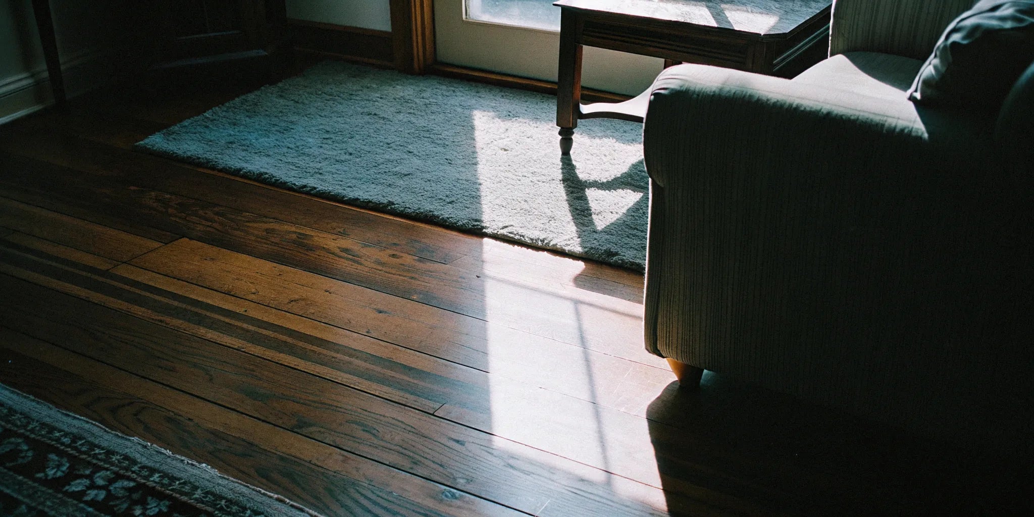 Hardwood flooring planks showing wood grain and finish.