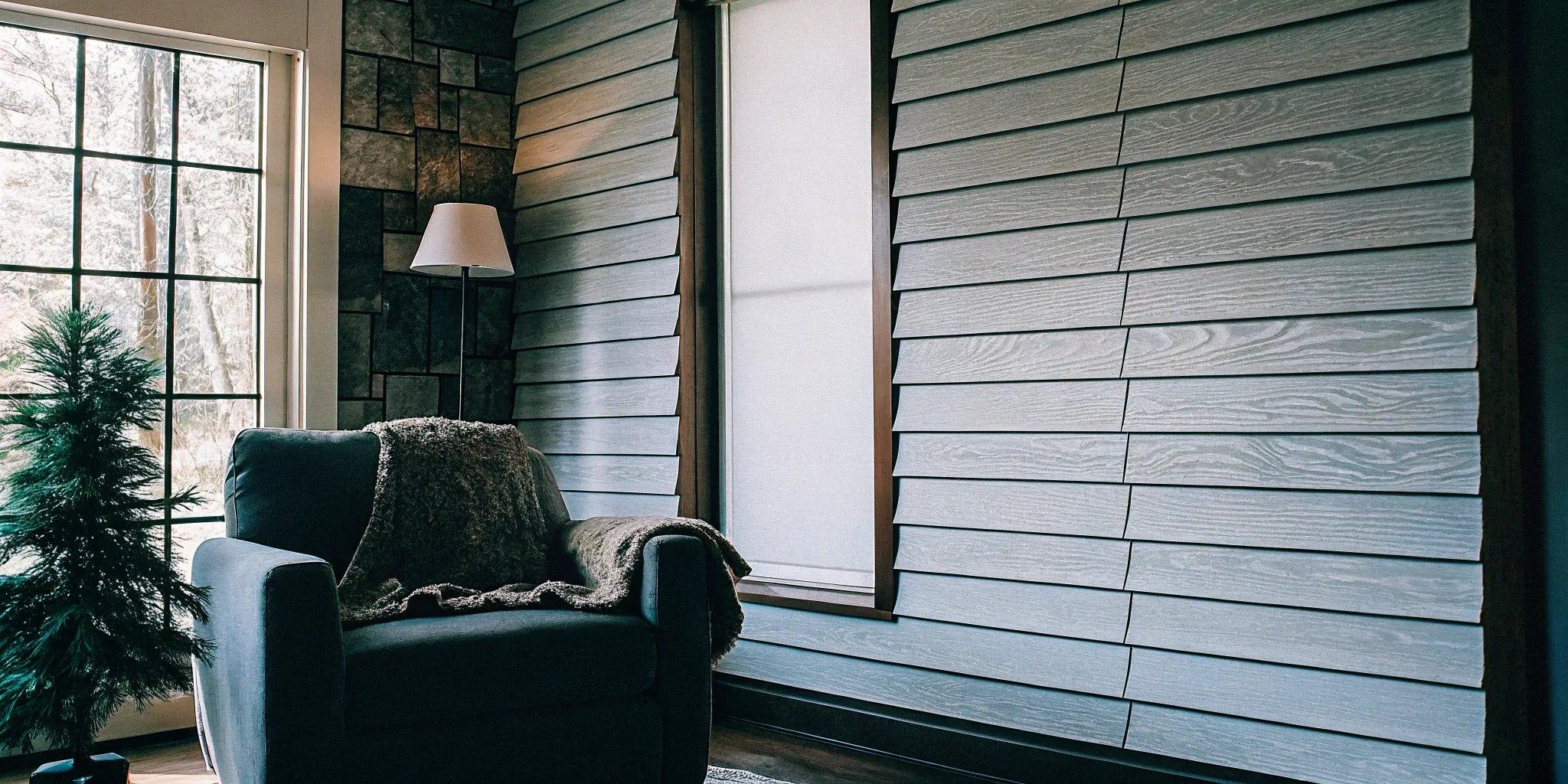 Stylish gray WPC wall panels in a modern living room.