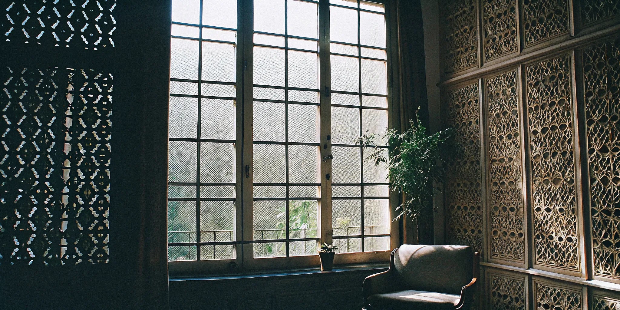 Vertical fluted MDF panels create a textured feature wall in a modern, sunlit room.