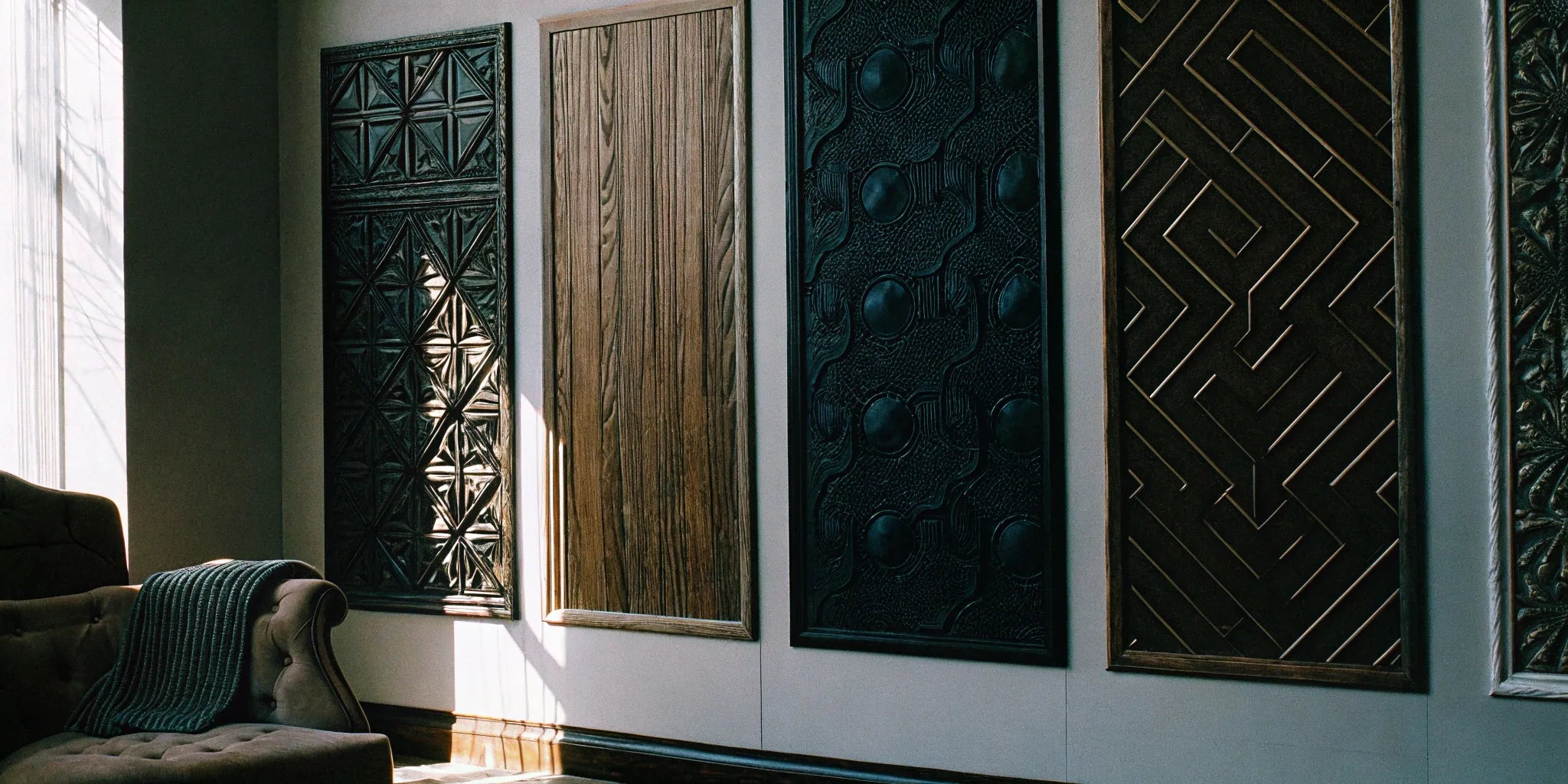 A modern room featuring a stylish accent wall of decorative veneer panels.