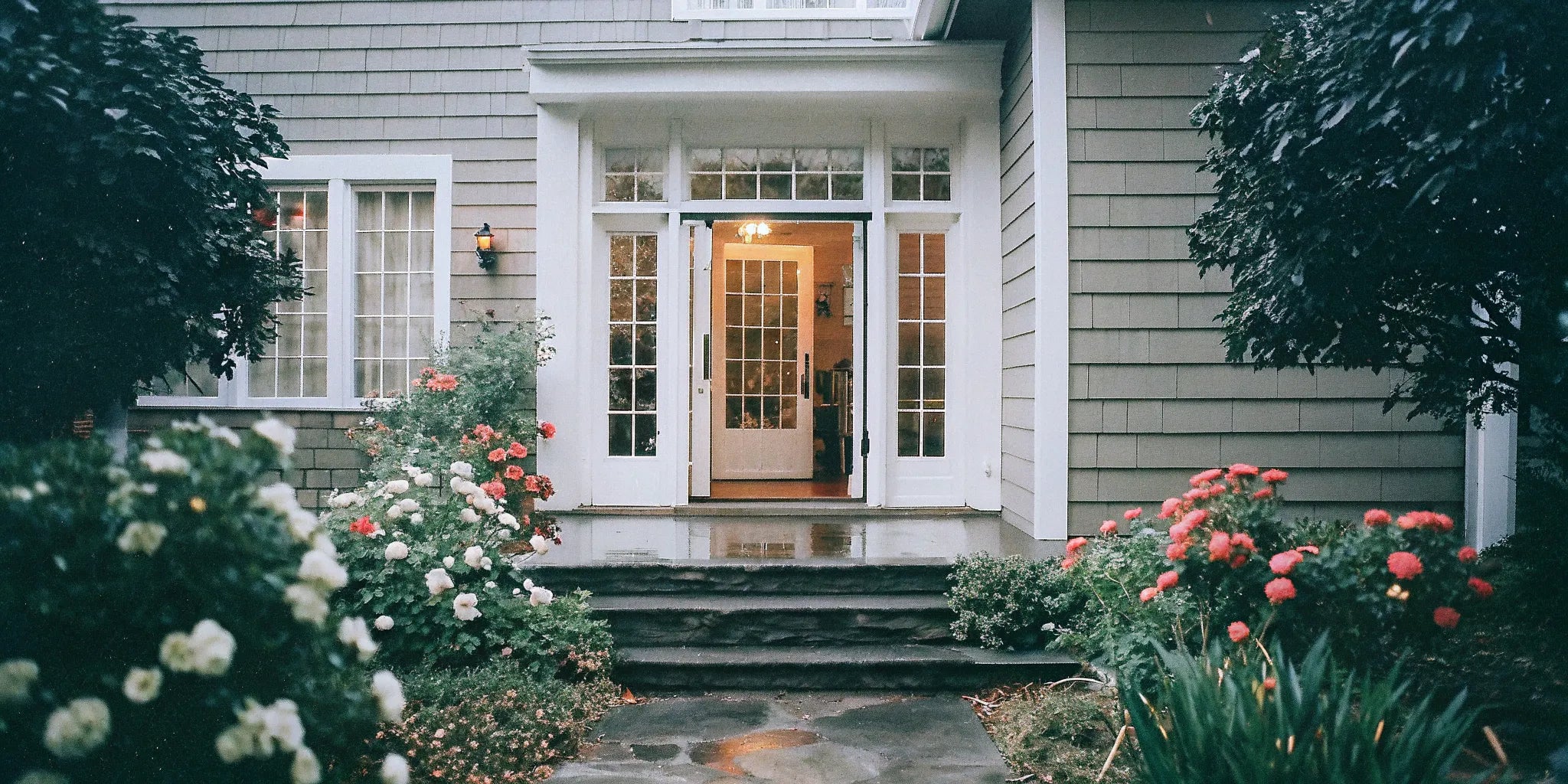 A stylish front door with sidelights that open for ventilation and natural light.